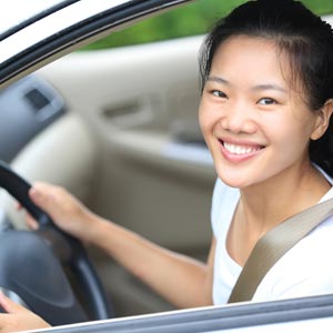 Woman Driving a Car